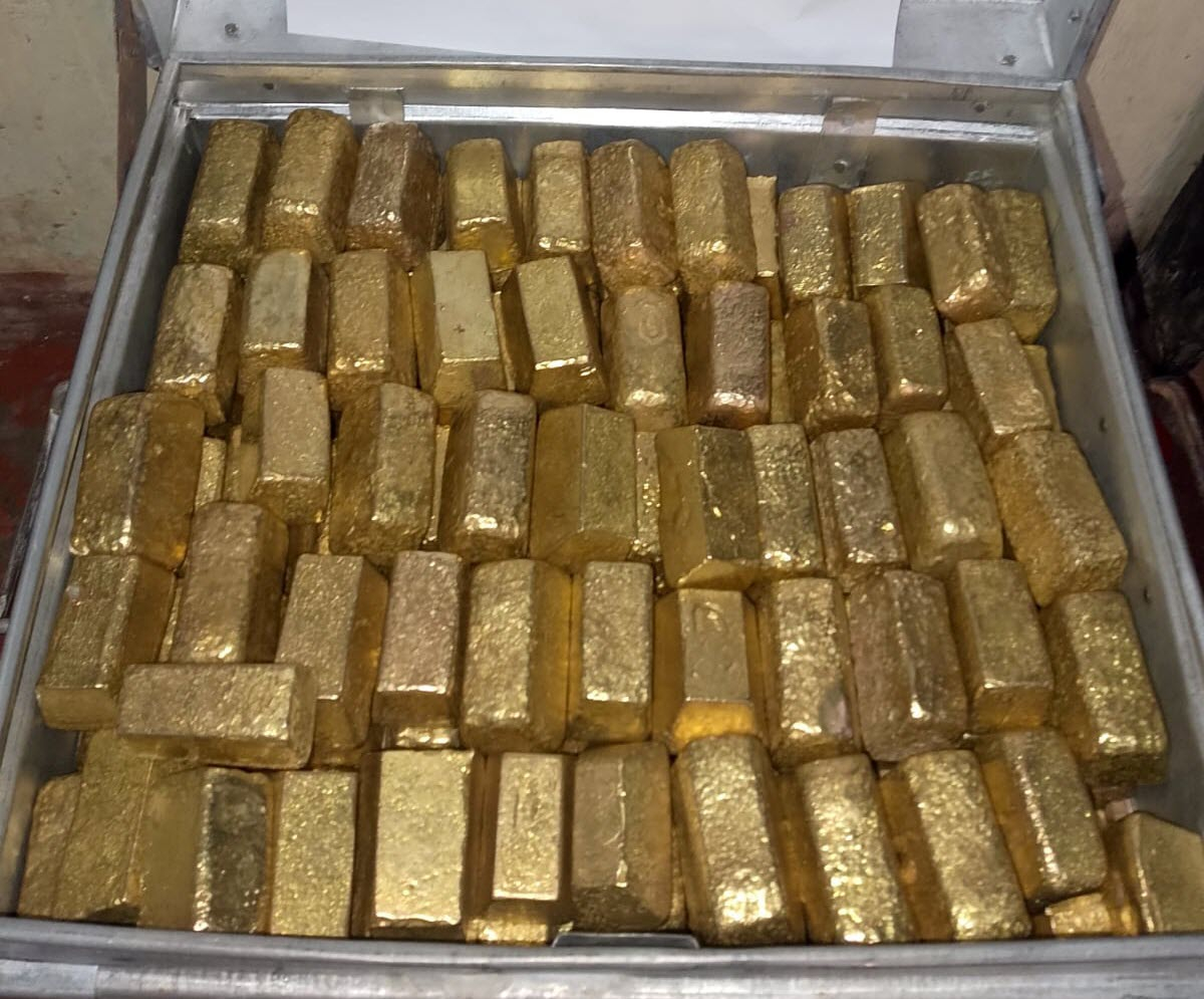 Stack of gold bars showing multiple hallmarks